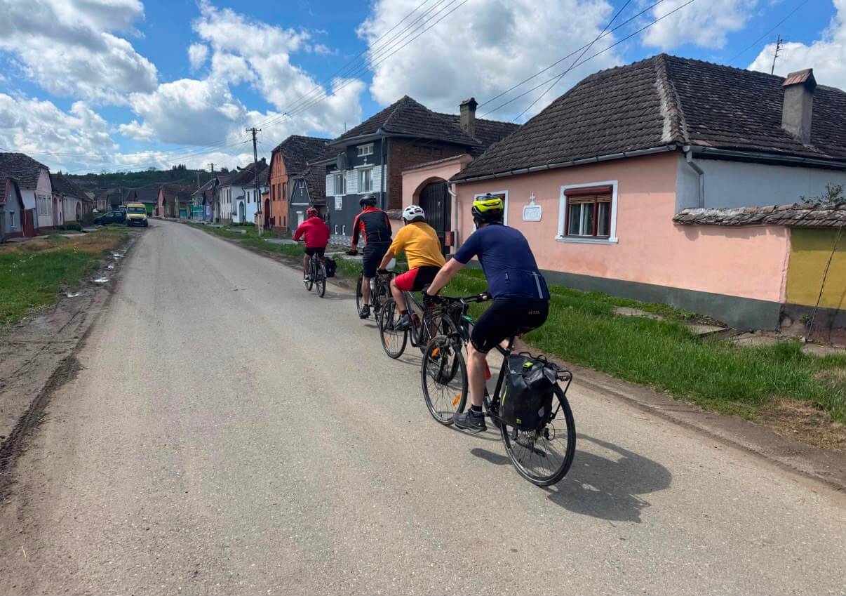 Cycling near traditional Romanian mountain villages