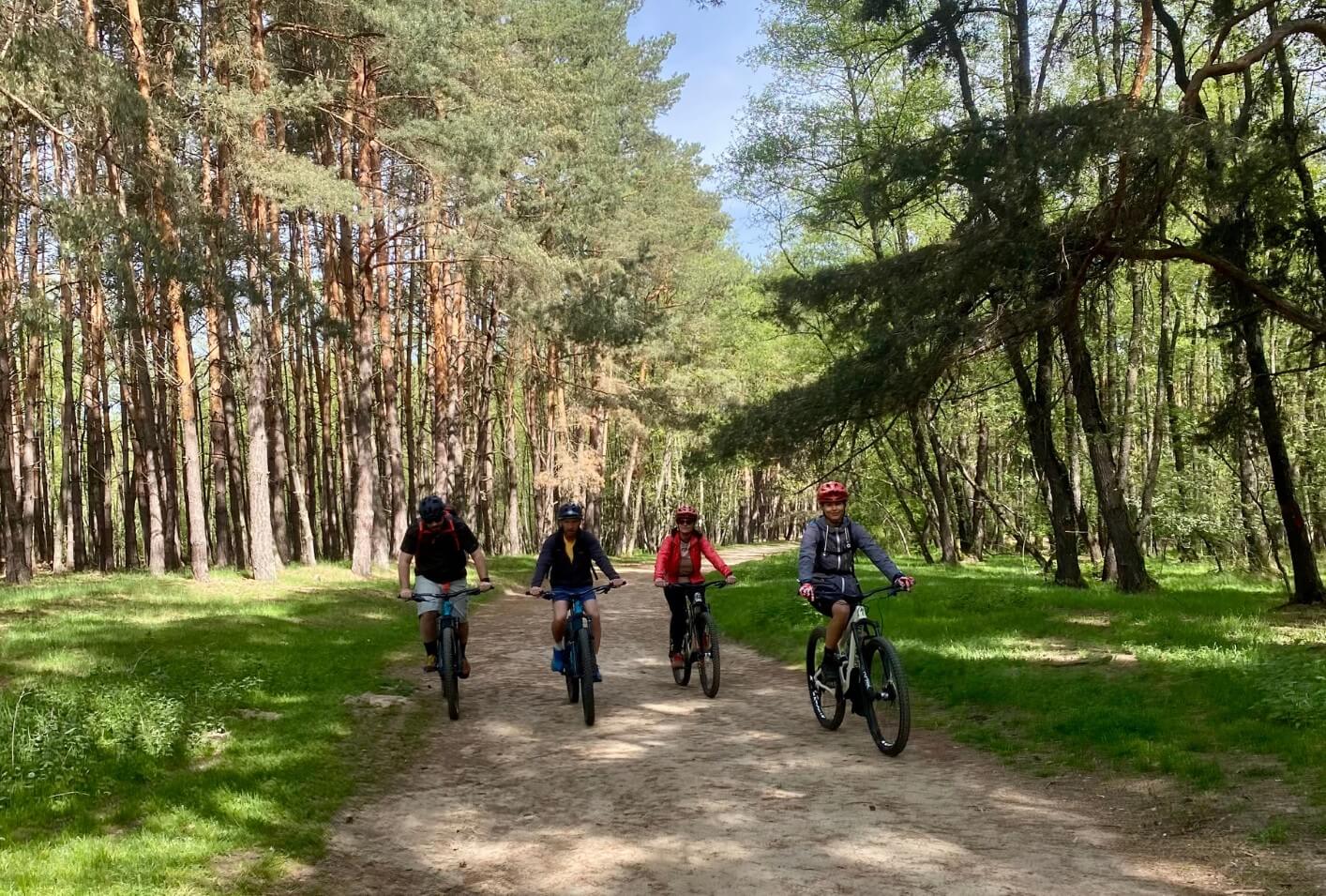 Mountain biker taking a break and admiring the Carpathian mountains view